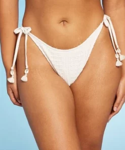 Women's Crochet Side-Tie Extra Cheeky Extra High Waist Bikini Bottom - Wild Fable™ Cream 16 Women's Crochet Side-Tie Extra Cheeky Extra High Waist Bikini Bottom - Wild Fable™ Cream -Default Template 7 GUEST 1b999c0e 1d74 437a a40a 8a5c4f1920fd